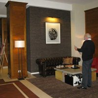 hôtel Ermitage : coin salon entre la véranda et le bar Le Birdie
